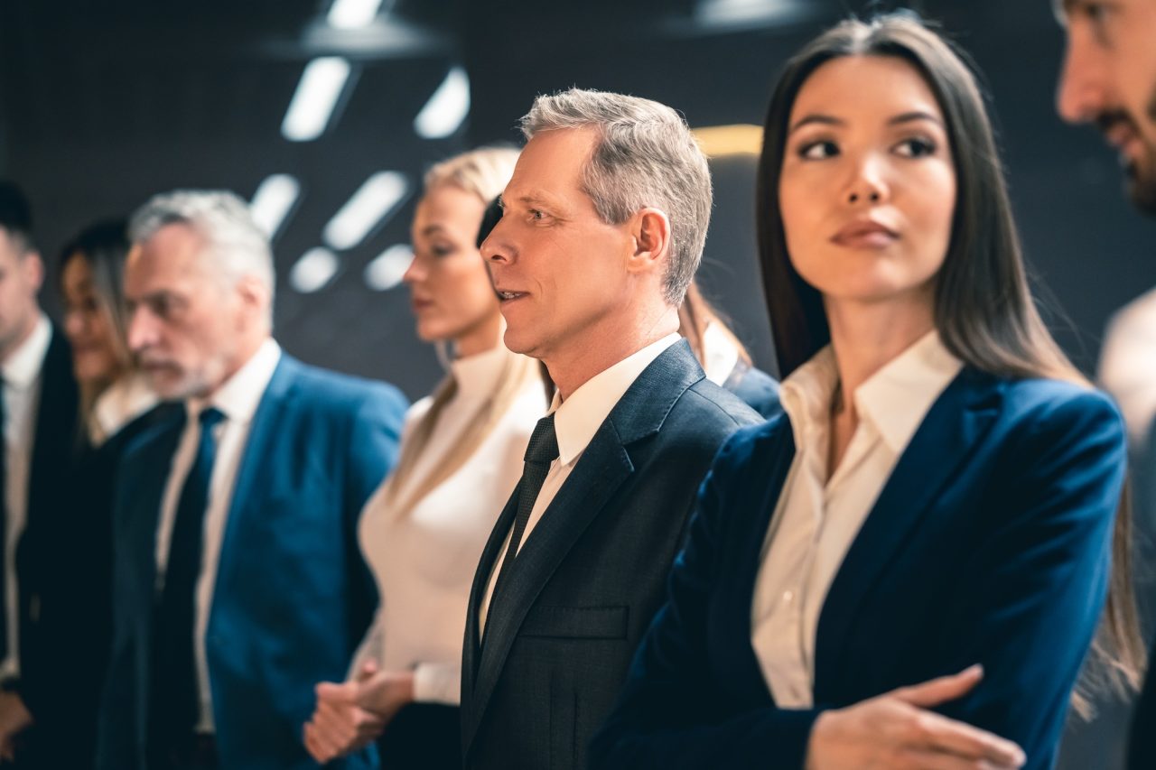 the-five-businesspeople-standing-indoor-.jpg